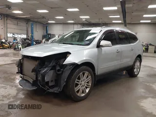 2013 Chevrolet Traverse LT with VIN 1GNKVGKD8DJ107615, listed as a IAAI auction lot 41785699 with 173,646 mi miles and . Bid and sale history available at DreamBid. Image 2.