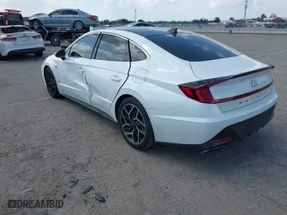 2021 Hyundai Sonata N Line with VIN 5NPEK4JC7MH125036, listed as a IAAI auction lot 41813459 with 32,131 mi miles. Bid and sale history available at carsss.com. Image 3.