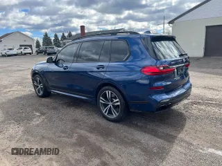 2020 BMW X7 M50i z VIN 5UXCX6C08L9B15440, wystawiony jako Copart lot #48511485 z przebiegiem 82 788 mil mil oraz Czysty tytuł • Clean title. Historia ofert i sprzedaży dostępna na DreamBid. Obrazek 2.