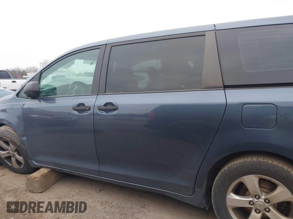 2015 Toyota Sienna L with VIN 5TDZK3DC6FS542457, listed as a IAAI auction lot 41072508 with 167,509 mi miles and . Bid and sale history available at DreamBid. Image 14.