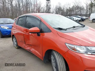 2020 Honda Fit LX z VIN 3HGGK5H45LM710897, wystawiony jako IAAI lot #41815222 z przebiegiem 100 304 mil mil oraz . Historia ofert i sprzedaży dostępna na DreamBid. Obrazek 6.