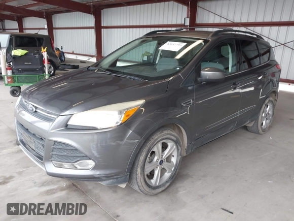 2014 Ford Escape SE with VIN 1FMCU0GXXEUC46554, listed as a IAAI auction lot 42057795 with 92,147 mi miles. Bid and sale history available at carsss.com. Image 2.