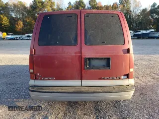 2000 Chevrolet Astro with VIN 1GNDM19W6YB180580, listed as a Copart auction lot 77676494 with 413,650 mi miles and Salvage Title. Bid and sale history available at carsss.com. Image 6.