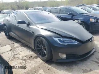 2020 Tesla Model S Long Range с VIN 5YJSA1E28LF400562, выставлен на аукционе Copart как лот 53576125 с пробегом 73 808 миль миль и Списание • Salvage title. История ставок и продаж доступна на DreamBid. Изображение 4.