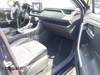 2021 Toyota RAV4 Hybrid LE with VIN 4T3B6RFV4MU025144, listed as a IAAI auction lot 42398033 with 65,994 mi miles and . Bid and sale history available at DreamBid. Image 5.