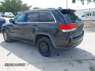 2014 Jeep Grand Cherokee Laredo with VIN 1C4RJEAG6EC136832, listed as a IAAI auction lot 42258348 with 151,647 mi miles and . Bid and sale history available at DreamBid. Image 3.