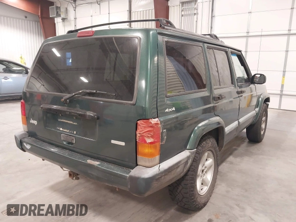 2000 Jeep Cherokee with VIN 1J4FF48SXYL116106, listed as a IAAI auction lot 42610059 with 191,513 mi miles and . Bid and sale history available at DreamBid. Image 4.