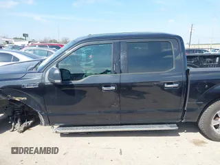 2015 Ford F-150 XLT with VIN 1FTEW1EF4FKD15422, listed as a IAAI auction lot 41593431 with 112,102 mi miles. Bid and sale history available at carsss.com. Image 14.