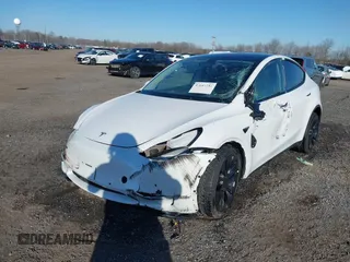 2022 Tesla Model Y Performance with VIN 7SAYGDEF5NF542189, listed as a IAAI auction lot 41643254 with 18,865 mi miles and . Bid and sale history available at DreamBid. Image 6.
