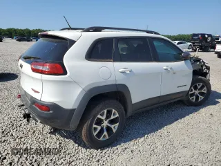 2015 Jeep Cherokee Trailhawk with VIN 1C4PJMBB1FW771865, listed as a Copart auction lot 61905315 with 99,554 mi miles and Clean title. Bid and sale history available at DreamBid. Image 3.