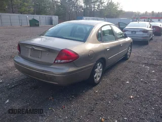 2007 Ford Taurus SEL with VIN 1FAFP56U87A153488, listed as a IAAI auction lot 41874575 with 182,451 mi miles and . Bid and sale history available at DreamBid. Image 4.