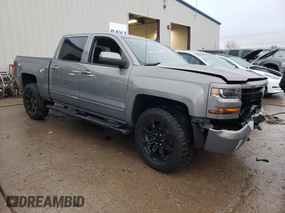 2017 Chevrolet Silverado 1500 LT with VIN 3GCUKREC0HG287527, listed as a Copart auction lot 84900274 with 121,617 mi miles and Salvage Title. Bid and sale history available at DreamBid. Image 4.