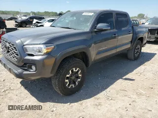 2023 Toyota Tacoma SR with VIN 3TMCZ5AN8PM561449, listed as a Copart auction lot 56636875 with 24,342 mi miles and Salvage title. Bid and sale history available at DreamBid. Image 1.
