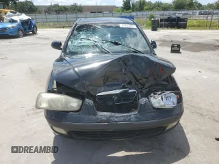 2003 Hyundai Elantra GLS with VIN KMHDN45D03U500898, listed as a Copart auction lot 61473825 with 127,252 mi miles and Salvage title. Bid and sale history available at DreamBid. Image 5.
