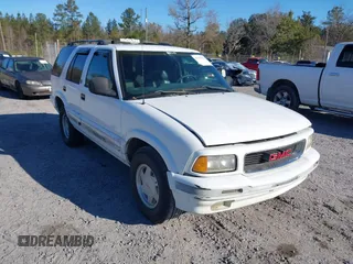 1997 GMC Jimmy SL with VIN 1GKCS13W9V2523837, listed as a IAAI auction lot 41359854 with 185,549 mi miles. Bid and sale history available at carsss.com. Image 1.