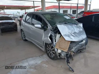 2013 Honda Fit Sport with VIN JHMGE8H54DC047839, listed as a IAAI auction lot 42083683 with 201,284 mi miles. Bid and sale history available at carsss.com. Image 1.