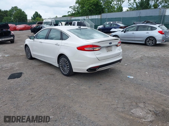 2017 Ford Fusion Titanium with VIN 3FA6P0K96HR115561, listed as a IAAI auction lot 42596030 with 187,865 mi miles and . Bid and sale history available at DreamBid. Image 3.