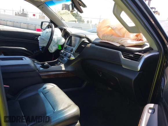 2018 Chevrolet Suburban LS z VIN 1GNSKGKC6JR150248, wystawiony jako IAAI lot #42219120 z przebiegiem 48 321 mil mil oraz . Historia ofert i sprzedaży dostępna na DreamBid. Obrazek 5.