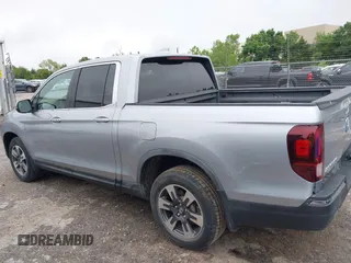 2018 Honda Ridgeline RTL with VIN 5FPYK3F52JB002649, listed as a IAAI auction lot 42338360 with 68,802 mi miles and . Bid and sale history available at DreamBid. Image 14.