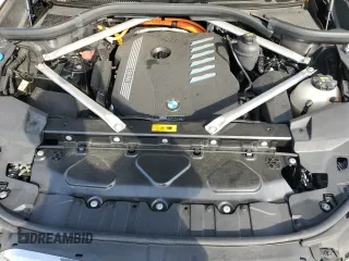 2023 BMW X5 xDrive45e z VIN 5UXTA6C03P9P26996, wystawiony jako Copart lot #53747565 z przebiegiem 52 599 mil mil oraz Szkoda całkowita • Salvage title. Historia ofert i sprzedaży dostępna na DreamBid. Obrazek 12.