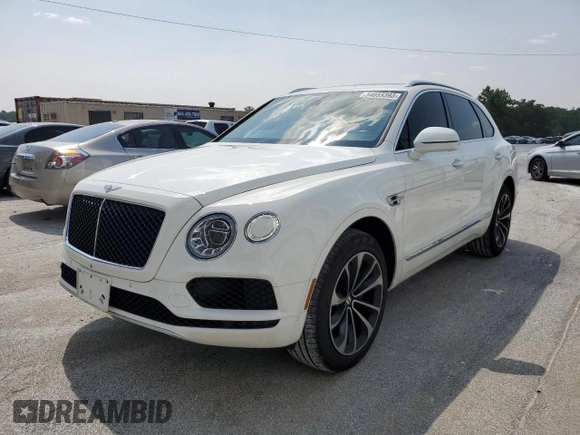 2019 Bentley Bentayga V8 z VIN SJAAM2ZV0KC026362, wystawiony jako Copart lot #54059393 z przebiegiem 31 530 mil mil oraz . Historia ofert i sprzedaży dostępna na DreamBid. Obrazek 1.