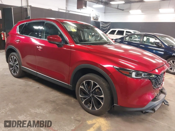 2023 Mazda CX-5 2.5 S Premium Plus Package with VIN JM3KFBEM5P0164568, listed as a IAAI auction lot 41843961 with 22,891 mi miles. Bid and sale history available at carsss.com. Image 1.