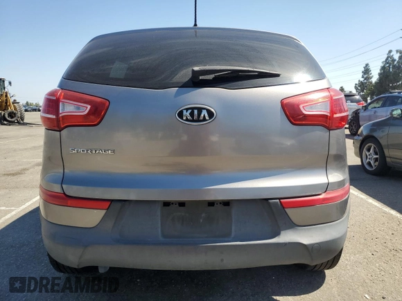 2012 Kia Sportage LX with VIN KNDPB3A22C7286908, listed as a Copart auction lot 58220115 with 171,114 mi miles and Clean title. Bid and sale history available at DreamBid. Image 6.