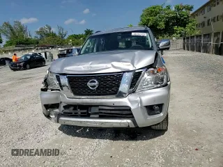 2017 Nissan Armada Platinum z VIN JN8AY2ND0H9008549, wystawiony jako Copart lot #56767515 z przebiegiem 60 152 mil mil oraz Szkoda całkowita • Salvage title. Historia ofert i sprzedaży dostępna na DreamBid. Obrazek 14.