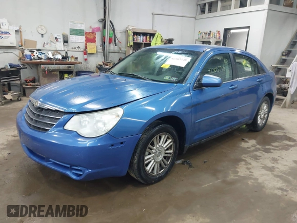 2007 Chrysler Sebring Touring z VIN 1C3LC56K57N508248, wystawiony jako IAAI lot #42305748 z przebiegiem 174 621 mil mil oraz . Historia ofert i sprzedaży dostępna na DreamBid. Obrazek 17.