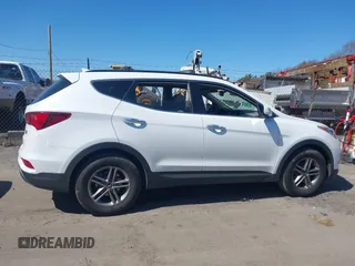 2017 Hyundai Santa Fe 2.4L z VIN 5NMZUDLB9HH028990, wystawiony jako IAAI lot #42055991 z przebiegiem 91 569 mil mil oraz . Historia ofert i sprzedaży dostępna na DreamBid. Obrazek 13.