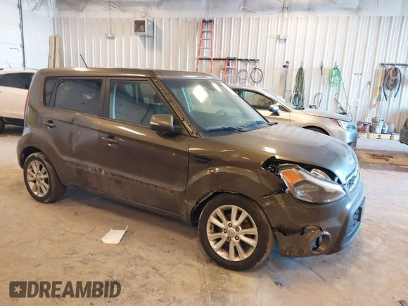 2012 Kia Soul + with VIN KNDJT2A64C7452975, listed as a IAAI auction lot 41635133 with 164,937 mi miles. Bid and sale history available at carsss.com. Image 1.