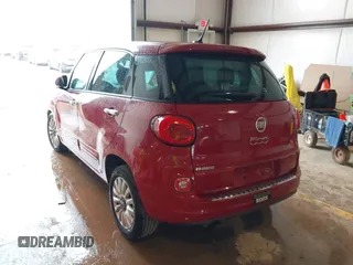 2015 FIAT 500L Easy with VIN ZFBCFABH4FZ031733, listed as a IAAI auction lot 40058070 with 79,801 mi miles and . Bid and sale history available at DreamBid. Image 3.