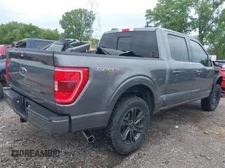 2021 Ford F-150 XL z VIN 1FTFW1ED7MFC02427, wystawiony jako IAAI lot #42336224 z przebiegiem 106 988 mil mil oraz . Historia ofert i sprzedaży dostępna na DreamBid. Obrazek 4.