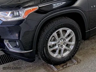 2020 Chevrolet Traverse LT Cloth with VIN 1GNEVGKW5LJ136101, listed as a IAAI auction lot 41980669 with 80,812 mi miles. Bid and sale history available at carsss.com. Image 1.