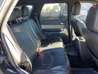 2010 Mercury Mariner Premier z VIN 4M2CN8H71AKJ24843, wystawiony jako Copart lot #41851875 z przebiegiem 147 858 mil mil oraz Szkoda całkowita • Salvage title. Historia ofert i sprzedaży dostępna na DreamBid. Obrazek 10.
