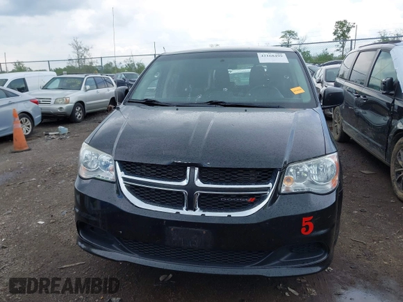 2017 Dodge Grand Caravan SE z VIN 2C4RDGBG0HR605507, wystawiony jako IAAI lot #42168499 z przebiegiem 169 422 mil mil oraz . Historia ofert i sprzedaży dostępna na DreamBid. Obrazek 12.