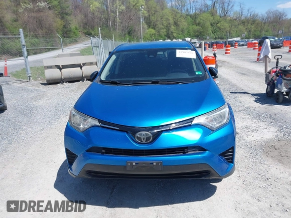 2018 Toyota RAV4 LE with VIN JTMZFREV4JJ734702, listed as a IAAI auction lot 41987540 with 141,526 mi miles. Bid and sale history available at carsss.com. Image 12.
