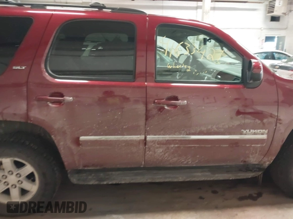 2011 GMC Yukon SLT with VIN 1GKS2CE08BR308792, listed as a IAAI auction lot 41633427 with 216,483 mi miles. Bid and sale history available at carsss.com. Image 13.