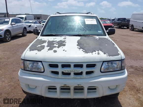 2001 Isuzu Rodeo S with VIN 4S2CK58W414357404, listed as a IAAI auction lot 42479053 with Not provided miles and . Bid and sale history available at DreamBid. Image 6.