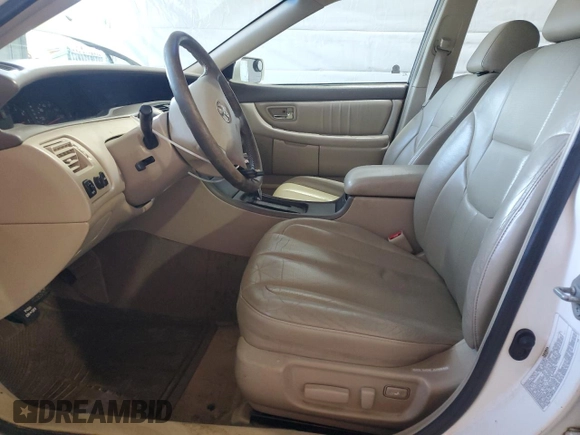 2003 Toyota Avalon XL z VIN 4T1BF28B53U321615, wystawiony jako Copart lot #52852895 z przebiegiem 218 633 mil mil oraz Szkoda całkowita • Salvage title. Historia ofert i sprzedaży dostępna na DreamBid. Obrazek 7.