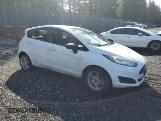 2018 Ford Fiesta SE with VIN 3FADP4EJ1JM128130, listed as a Copart auction lot 50574285 with 141,002 mi miles and Salvage Title. Bid and sale history available at DreamBid. Image 4.