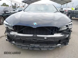 2024 BMW 8 Series M850i z VIN WBAGV8C02RCR25432, wystawiony jako IAAI lot #42068364 z przebiegiem 13 765 mil mil oraz . Historia ofert i sprzedaży dostępna na DreamBid. Obrazek 6.