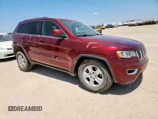2017 Jeep Grand Cherokee Laredo with VIN 1C4RJFAG7HC693789, listed as a Copart auction lot 61827925 with 143,019 mi miles and Salvage title. Bid and sale history available at DreamBid. Image 4.