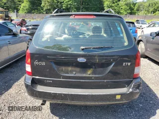 2004 Ford Focus ZTW with VIN 1FAFP35Z84W203676, listed as a Copart auction lot 57272835 with 183,115 mi miles and Salvage title. Bid and sale history available at DreamBid. Image 6.