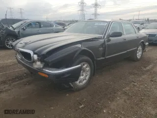 2000 Jaguar XJ with VIN SAJDA14C7YLF11390, listed as a Copart auction lot 73054184 with 0 mi miles and Salvage Title. Bid and sale history available at carsss.com. Image 1.