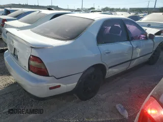 1995 Honda Accord LX with VIN 1HGCD5634SA021951, listed as a Copart auction lot 75093974 with 219,733 mi miles and Salvage Title. Bid and sale history available at carsss.com. Image 3.