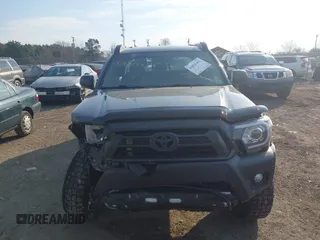 2014 Toyota Tacoma with VIN 3TMLU4EN3EM151545, listed as a IAAI auction lot 41821451 with 261,311 mi miles. Bid and sale history available at carsss.com. Image 13.
