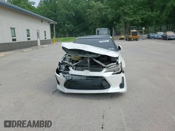 2016 Scion tC z VIN JTKJF5C73GJ024430, wystawiony jako Copart lot #59889055 z przebiegiem 142 532 mil mil oraz Szkoda całkowita • Salvage title. Historia ofert i sprzedaży dostępna na DreamBid. Obrazek 13.
