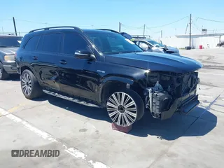 2021 Mercedes-Benz GLS 63 AMG z VIN 4JGFF8KE8MA368633, wystawiony jako IAAI lot #42239441 z przebiegiem 65 319 mil mil oraz . Historia ofert i sprzedaży dostępna na DreamBid. Obrazek 1.