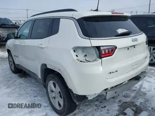 2019 Jeep Compass Latitude with VIN 3C4NJDBB0KT813014, listed as a IAAI auction lot 41560221 with 63,307 mi miles. Bid and sale history available at carsss.com. Image 3.